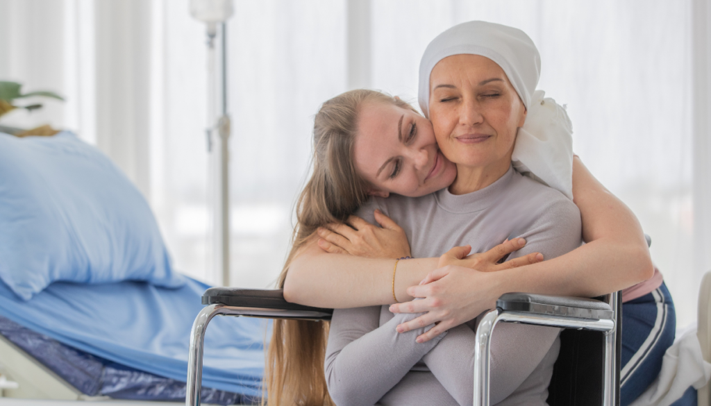 Woman hugging cancer patient